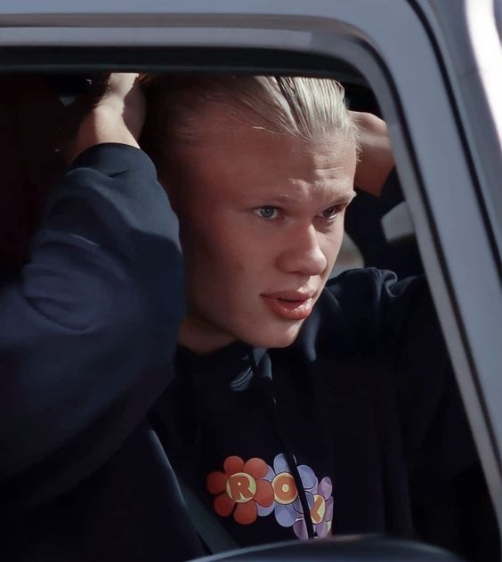 lamtac erling haaland cruises in the tumbler f supercar valued at million with horsepower along a scenic road in norway sporting a ponytail 65c90876c5d00